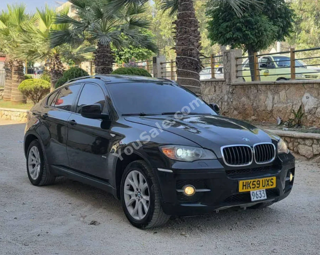 بي ام دبليو الفئة - اكس 6 2009 اتوماتيك 235,000 كم 4 سلندر دفع رباعي اس يو في أسود ديزل