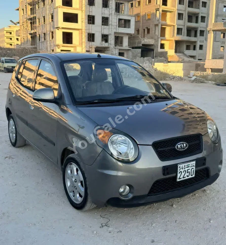 كيا بكانتو 2010 اتوماتيك 171,000 كم 4 سلندر دفع أمامي هاتشباك رمادي بنزين