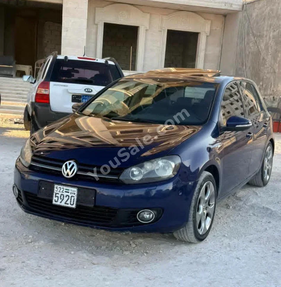 فوكس واغن غولف تي اس آي 2011 اتوماتيك 136,000 كم 4 سلندر دفع أمامي هاتشباك أزرق غامق بنزين