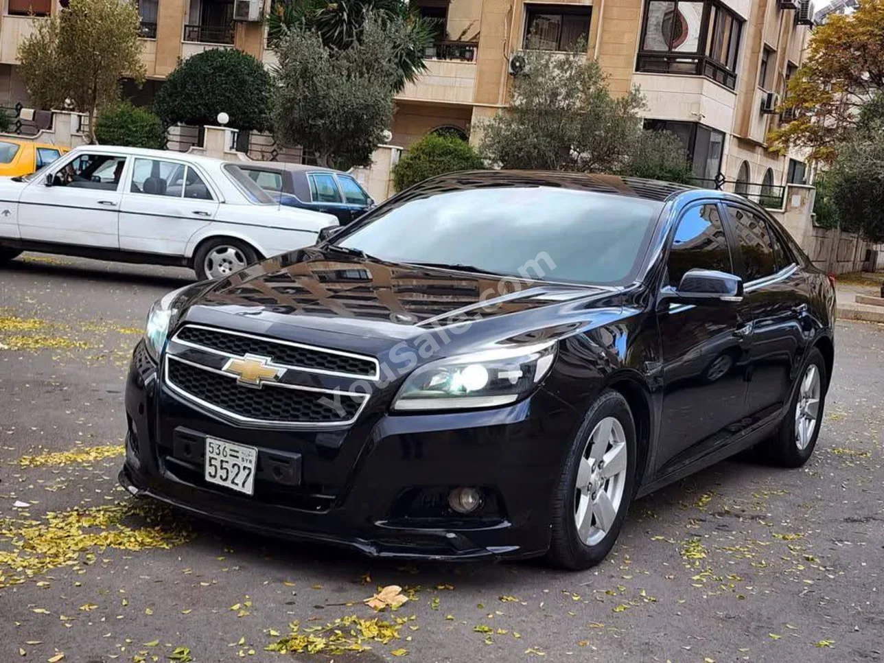 شفروليه ماليبو 2015 اتوماتيك 230,000 كم 4 سلندر دفع أمامي سيدان أسود بنزين