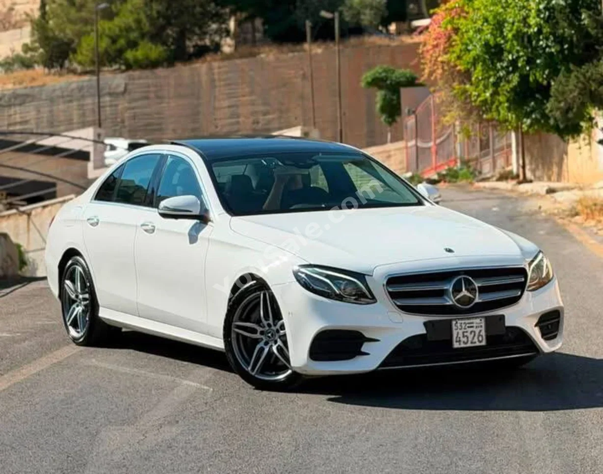 Mercedes-Benz  E-Class  300  2020  Automatic  141,000 km  4 Cylinder  4WD  Sedan  White  Gasoline