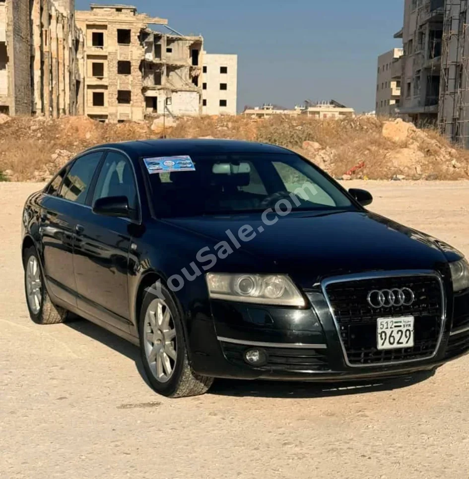 اودي أي 6 3.0 2006 اتوماتيك 175,000 كم 4 سلندر دفع خلفي سيدان أسود بنزين