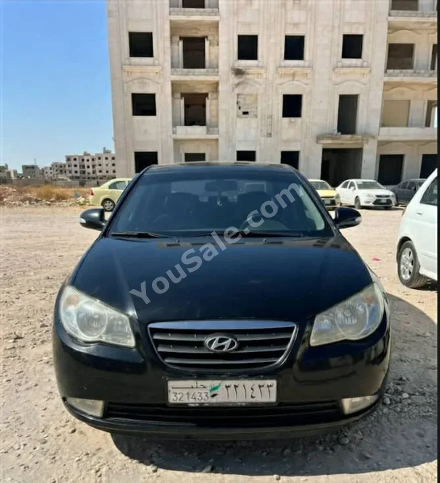 هيونداي افانتي 2008 اتوماتيك 175,000 كم 4 سلندر دفع أمامي سيدان أسود بنزين