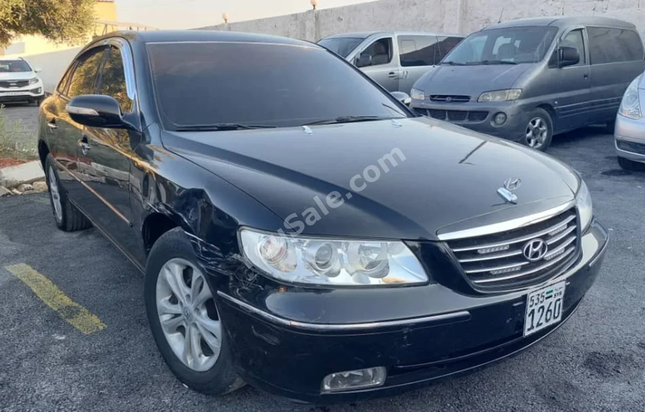 هيونداي غراندير 2010 اتوماتيك 275,000 كم 4 سلندر دفع أمامي سيدان أسود بنزين