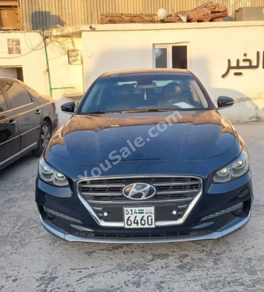 هيونداي غراندير 2017 اتوماتيك 125,000 كم 4 سلندر دفع أمامي سيدان أسود بنزين
