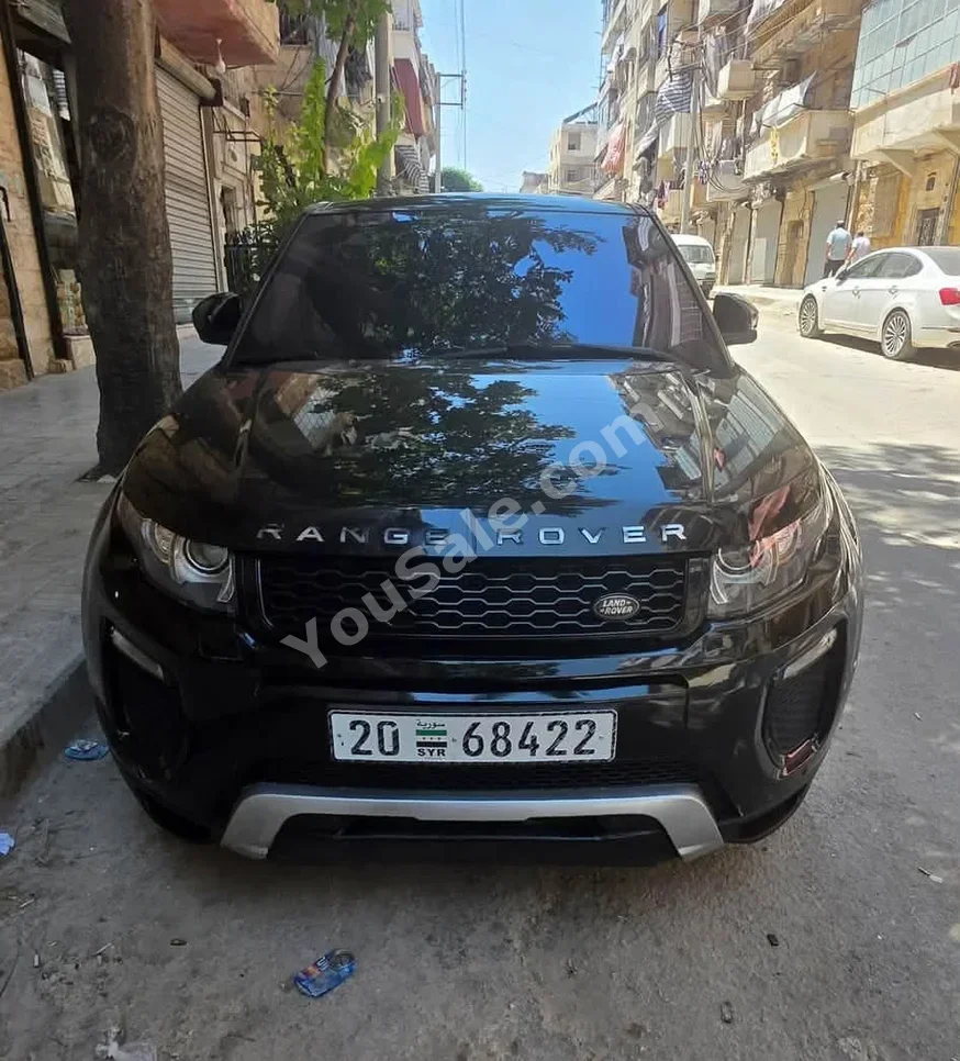 لاند روفر أيفوك 2015 اتوماتيك 98,000 كم 4 سلندر دفع رباعي اس يو في أسود بنزين