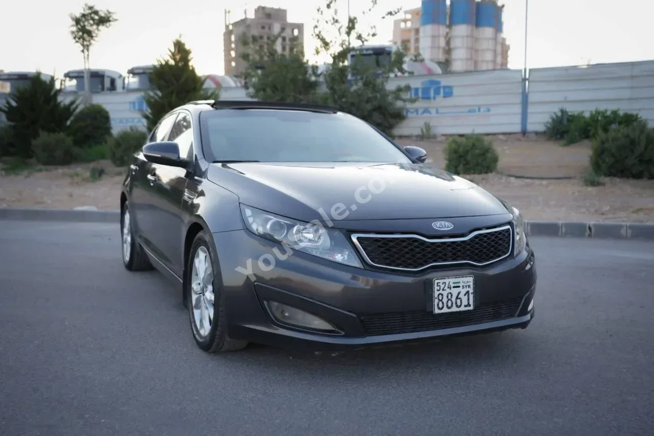 Kia  Optima  2011  Automatic  161,000 km  4 Cylinder  FWD  Sedan  Gray  Gasoline