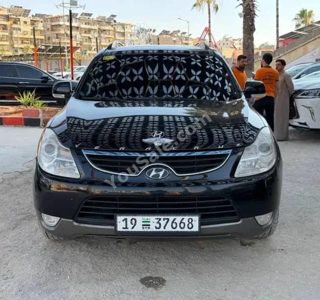 هيونداي فيراكروز 2009 اتوماتيك 69,000 كم 6 سلندر دفع خلفي اس يو في أسود ديزل