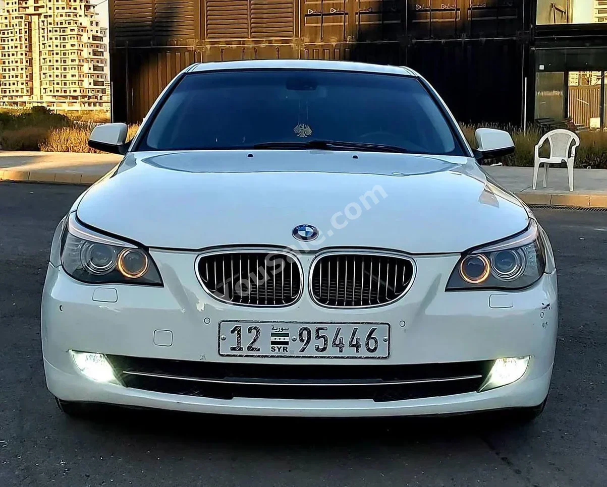 BMW  5-Series  520i  2011  Automatic  146,000 km  4 Cylinder  RWD  Sedan  White  Gasoline