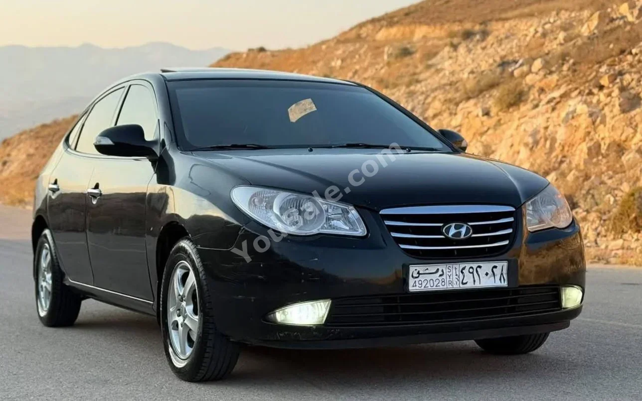 Hyundai  Elantra  2011  Automatic  177,000 km  4 Cylinder  FWD  Sedan  Black  Gasoline