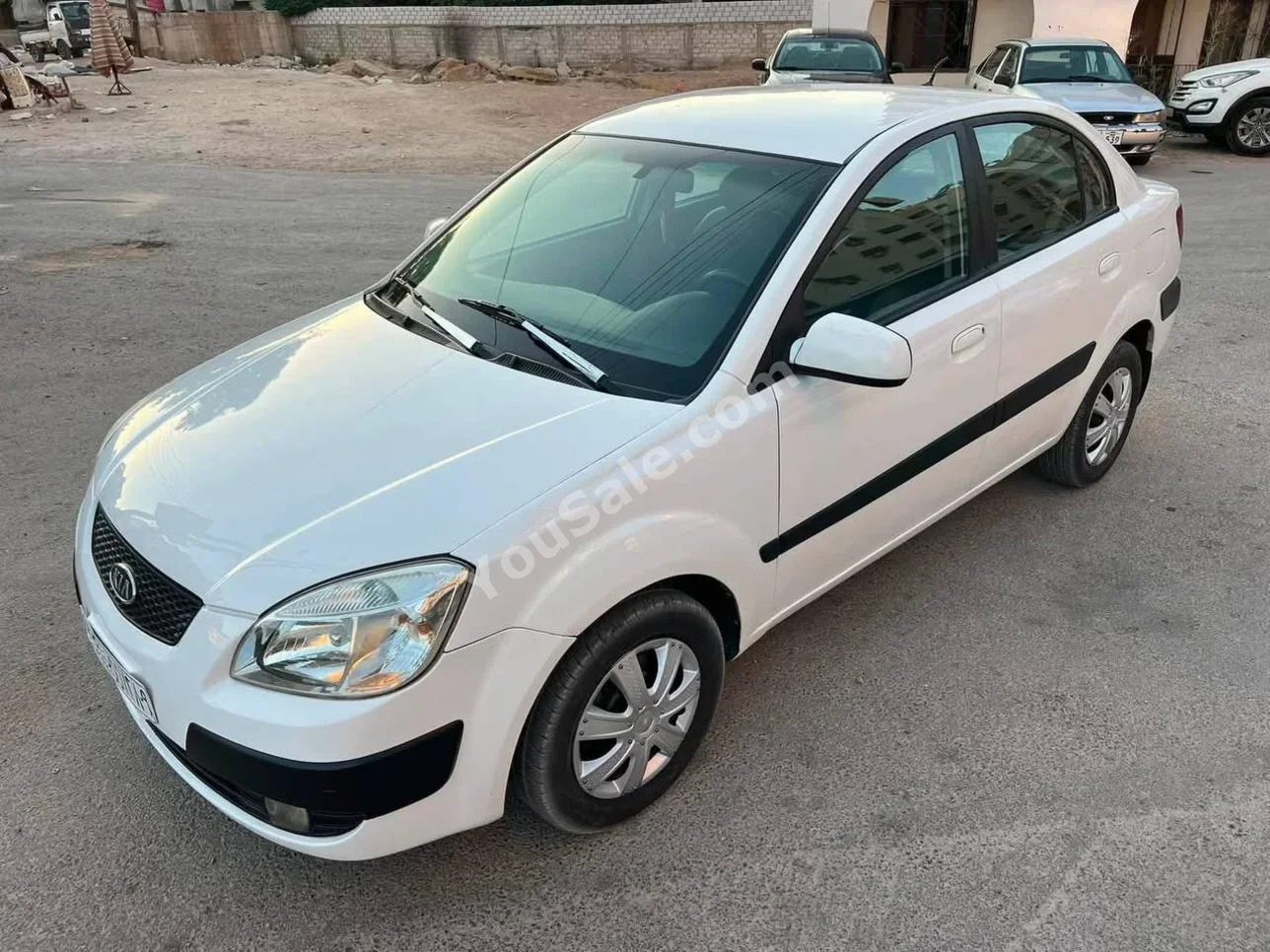 كيا ريو 2008 اتوماتيك 110,000 كم 4 سلندر دفع أمامي سيدان أبيض بنزين